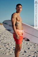 Red Sand Beach recycled plastic photo on boardshorts 
