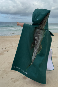 Child wearing Sorus Kids Explorer Poncho at the beach