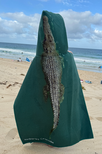 Kids sand-free recycled poncho towel after swimming
