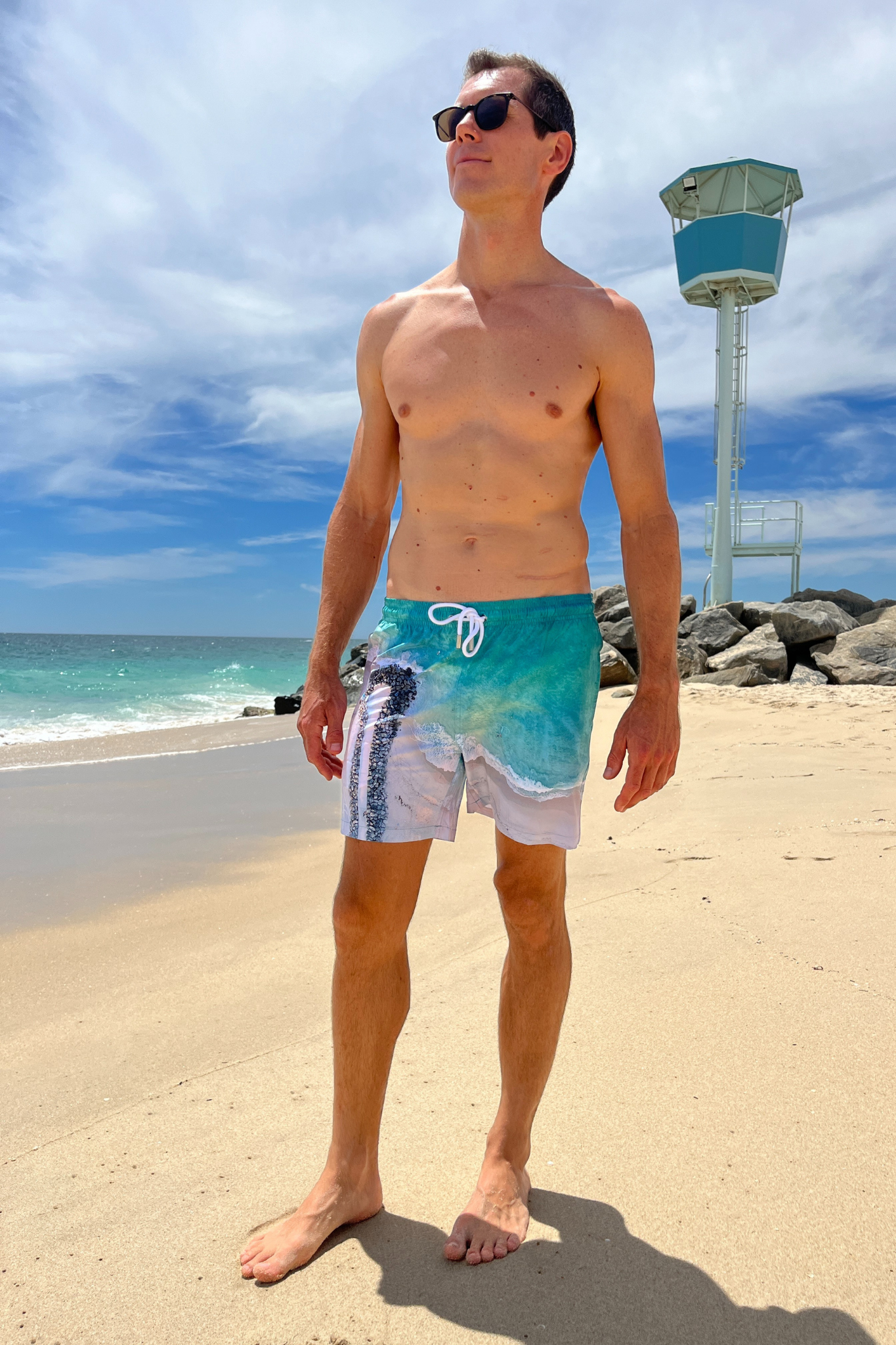Mens recycled boardies with City Beach, WA front view
